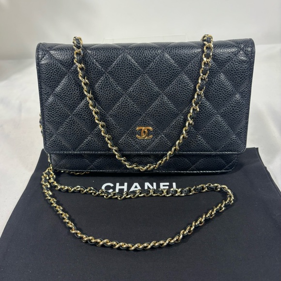 CHANEL Handbags - Gorgeous Chanel Woc black caviar gold hardware Sold